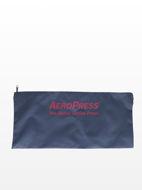 Navy blue carrying case with red 'AeroPress' logo.