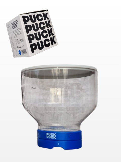 Clear plastic container with blue base and 'Puck Puck' branding and packaging box.