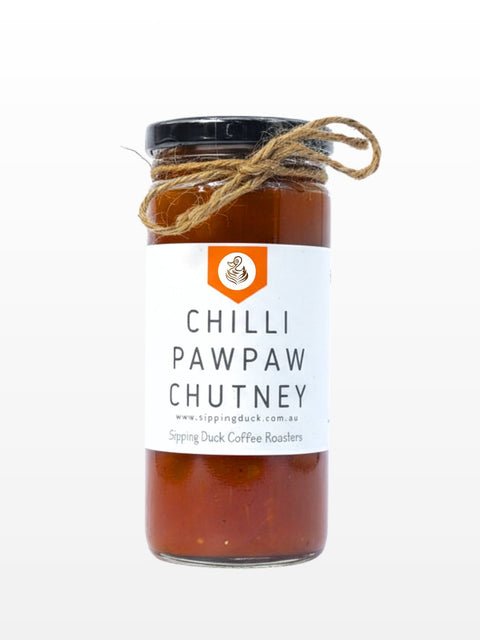 Chilli Pawpaw Chutney in glass jar, front label visible.