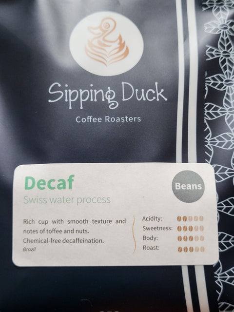 Sipping Duck Decaf Swiss water process label with profile description.
