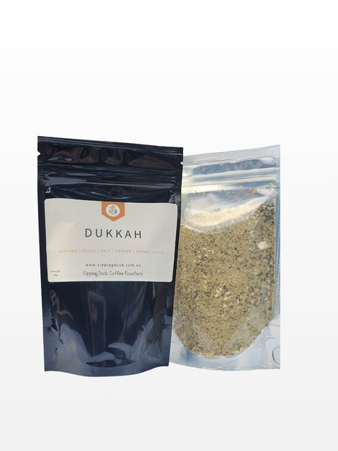 Clear packaging of Sipping Duck Dukkah showing the product inside and the label with weight and ingredients.