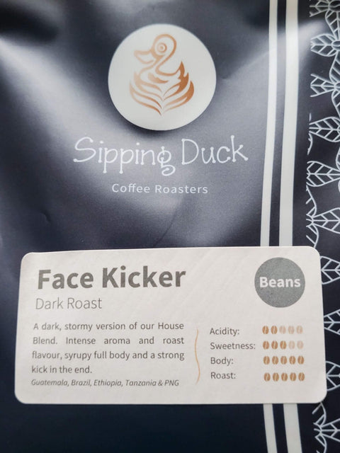 Sipping Duck Specialty Coffee Roasters Face Kicker Blend, dark roast profile description label and logo.