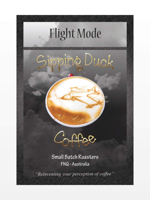 Sipping Duck Small Batch Roasters Flight Mode old label with latte art of a plane.