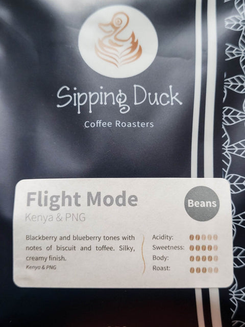 Sipping Duck Coffee Roasters Flight Mode Blend, blend description. Biscuit and toffee. Silky, creamy finish.